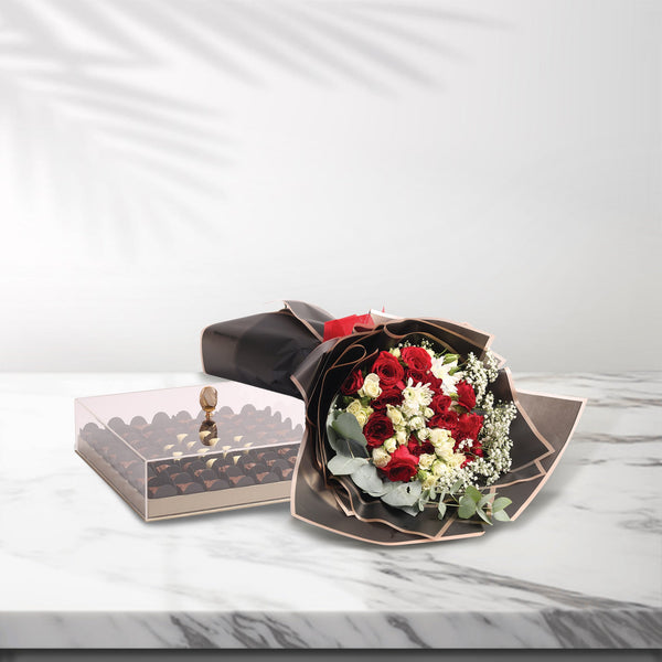 : A package of roses Big size and chocolate Belgian with Italian filling