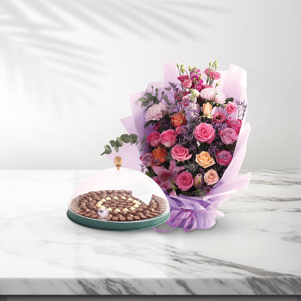 A package of flowers big size and chocolates.