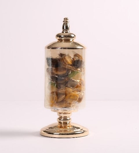 A jar of petit four dipped in Italian filling